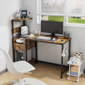 Computer Desk with Power Outlet & USB Charging Station — 48" Gaming Desk with RGB LED Lights | 4-Tier Reversible Storage Shelves & Drawer | Headphone Hooks | Sturdy Metal Frame | Home Office, Study, PC Workstation | Black/Brown