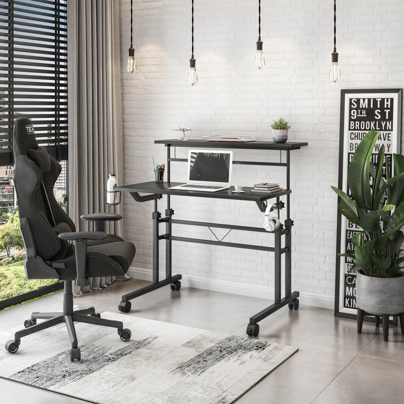 Rolling Writing Desk with Height-Adjustable Desktop | Moveable Riser Shelf | Front Locking Wheels | Integrated Cup & Headphone Holders | Carbon Fiber-Like Particle Board Top | 110 lbs Capacity | 5-Year Warranty | Home Office | Black