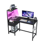 Computer Desk with Power Outlet & USB Charging Station — 48" Gaming Desk with RGB LED Lights | 4-Tier Reversible Storage Shelves & Drawer | Headphone Hooks | Sturdy Metal Frame | Home Office, Study, PC Workstation | Black/Brown